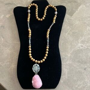 Beaded necklace with crystal stone pendant